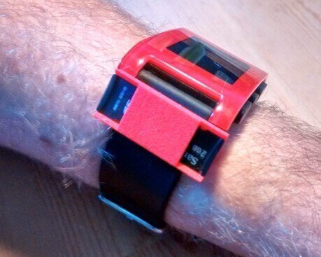 The microSD holder neatly attaches to your Pebble's watchband (source: Shapeways)