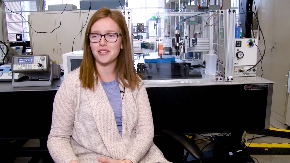 Murray next to her custom-built printer