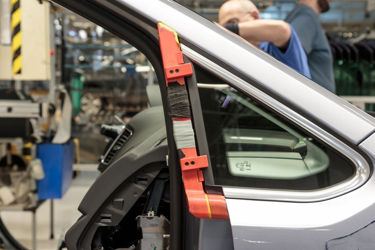 A 3D printed jig on a Volkswagen assembly line.
