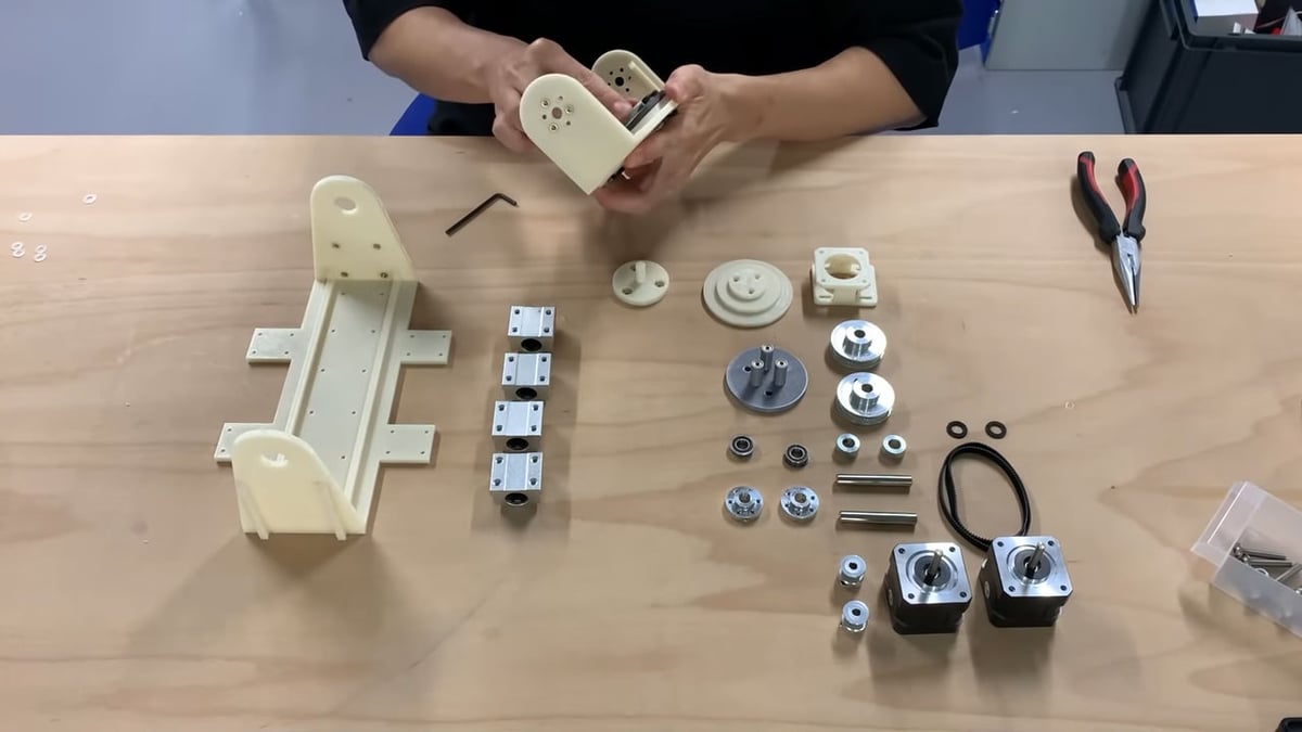 Assembling 3D printed parts and other hardware to make Open5x