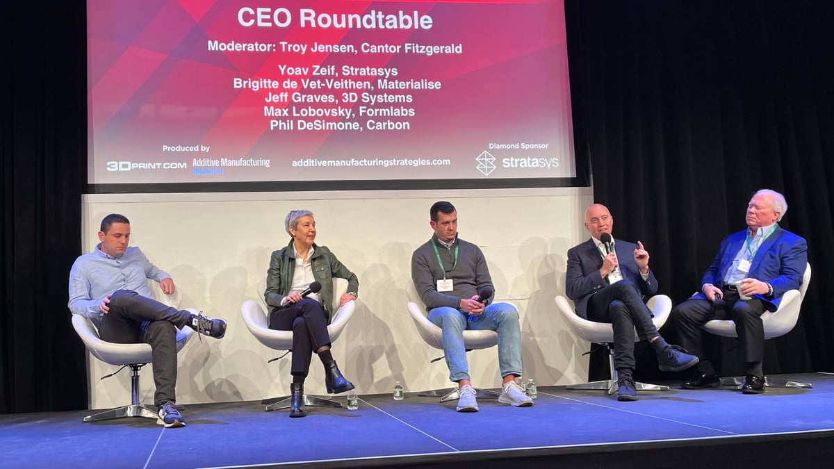 On stage from right to left: Jeff Graves (3D Systems), Yoav Zeif (Stratasys), Phil DeSimone (Carbon), Brigitte de Vet-Veithen (Materialise), Max Lobovsky (Formlabs). (Source: AMS)