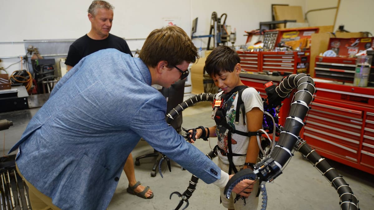 Featured image of World’s Youngest Bitcoin Millionaire 3D Prints Functional Dr. Octopus Suit to Defeat Hypermobility