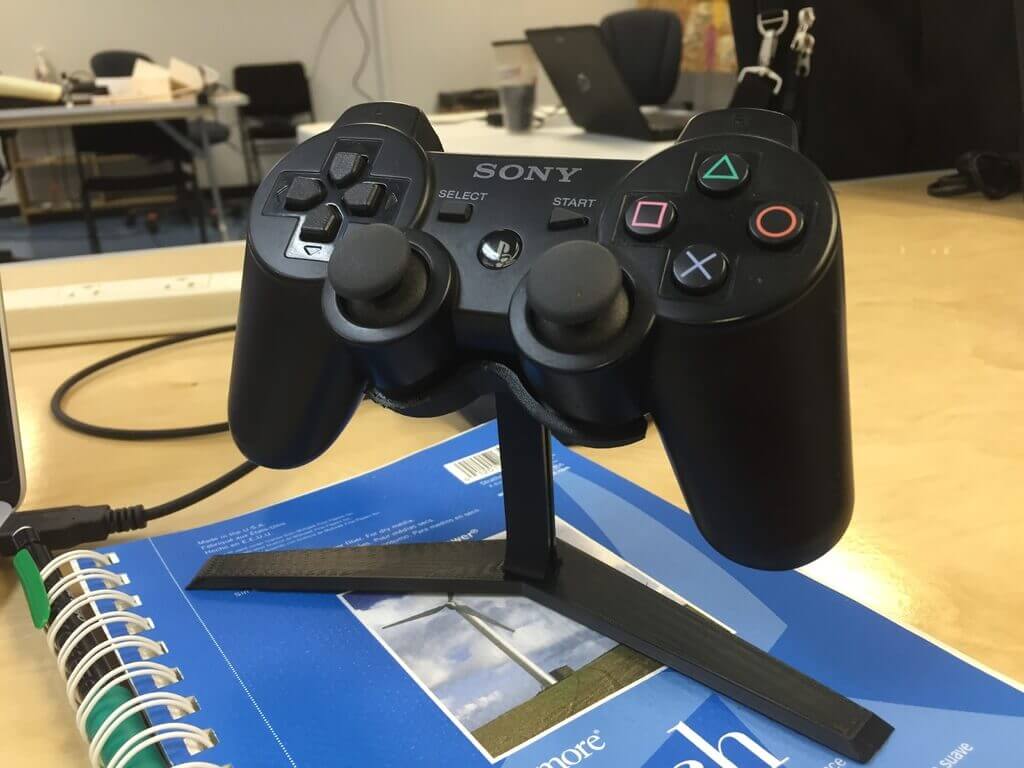 Image of 15 Best PS3 Accessories to DIY or Buy: PS3 Controller Stand