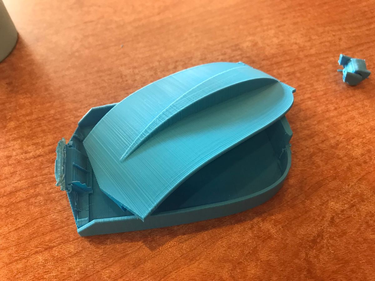 Our second prototype with a reinforced spine and a broken hinge.