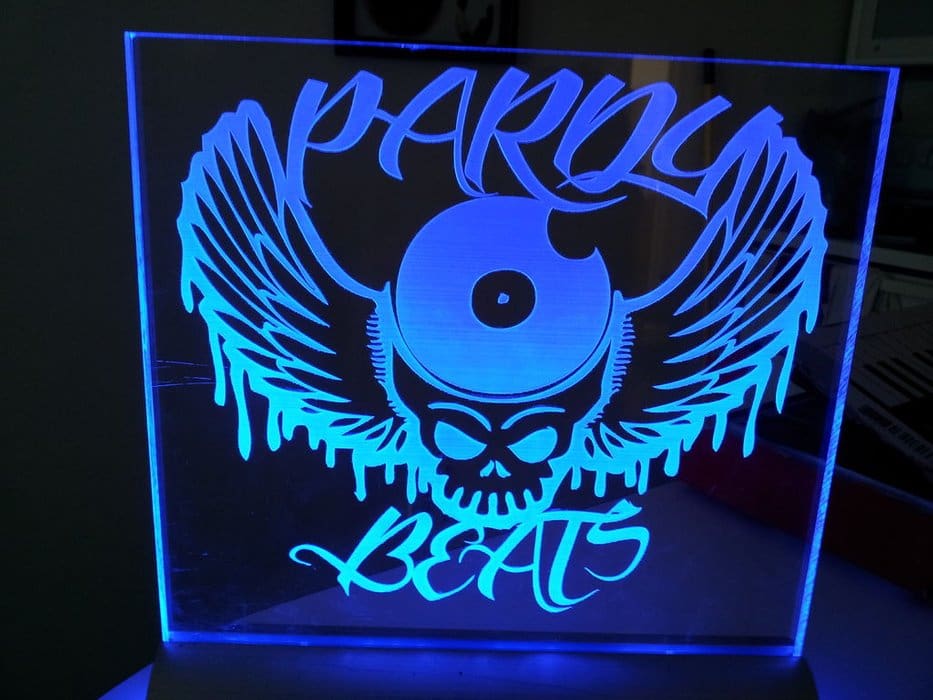 An edge-lit sign, illuminated with blue LEDs.