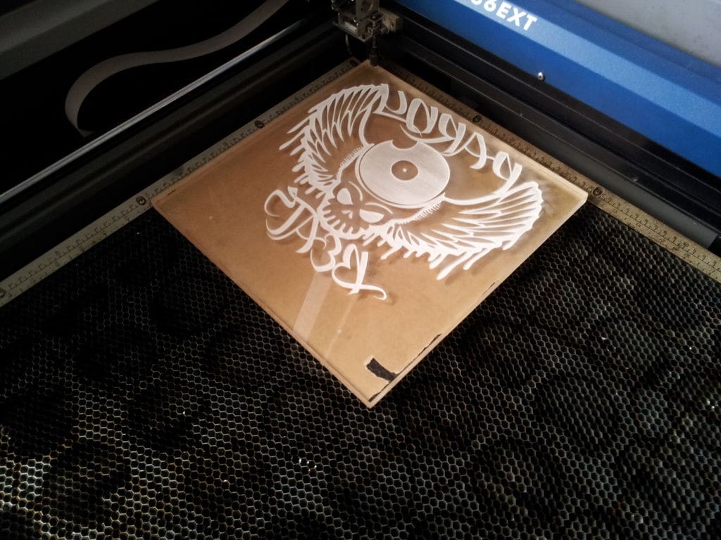 Engraving the sign.