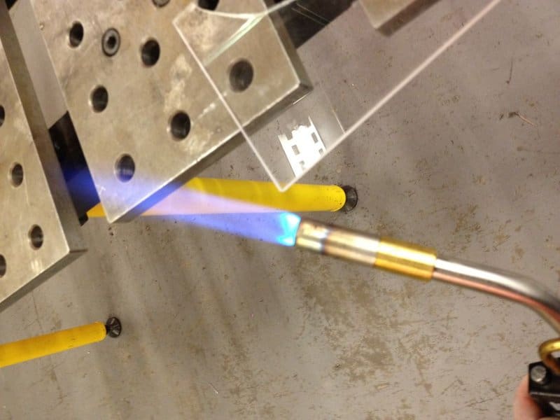 Flame polishing acrylic.
