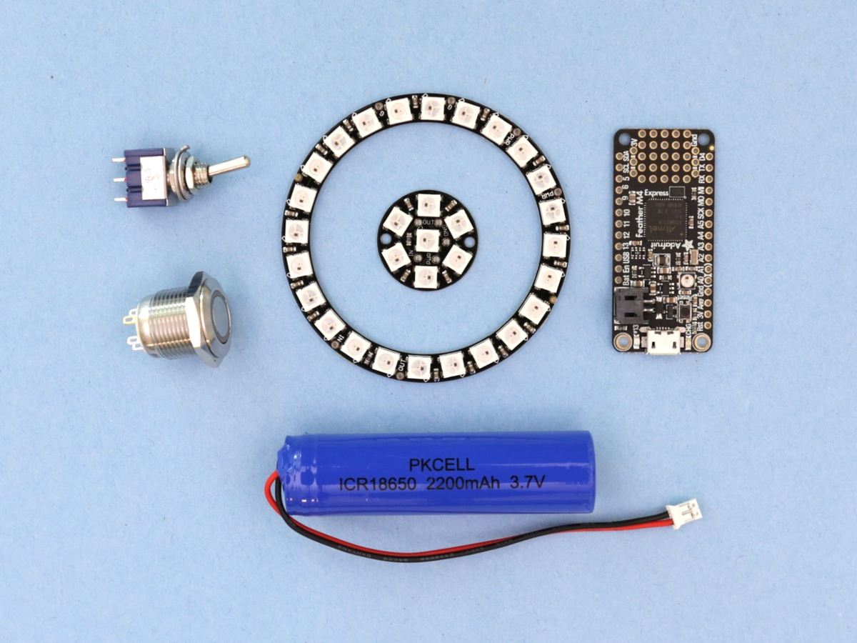 Switch, LED button, Ring, Jewel, Feather, and battery.