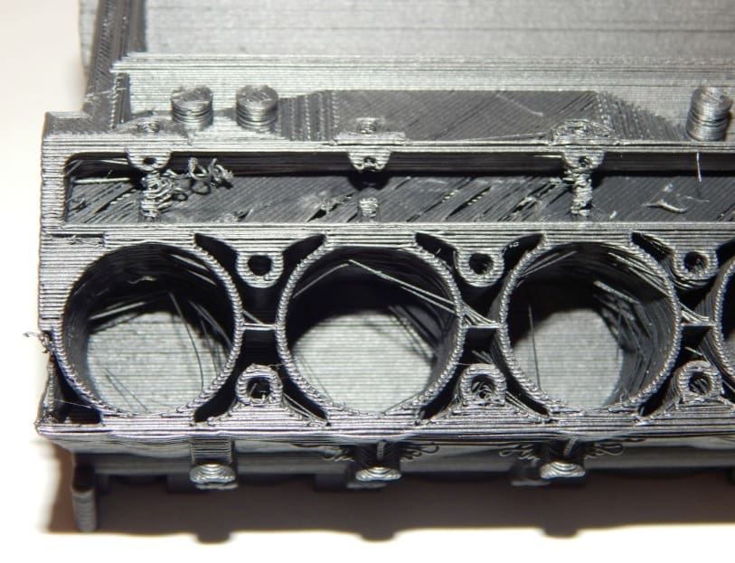 A closer look at the cylinders of this engine reveals many printing issues.