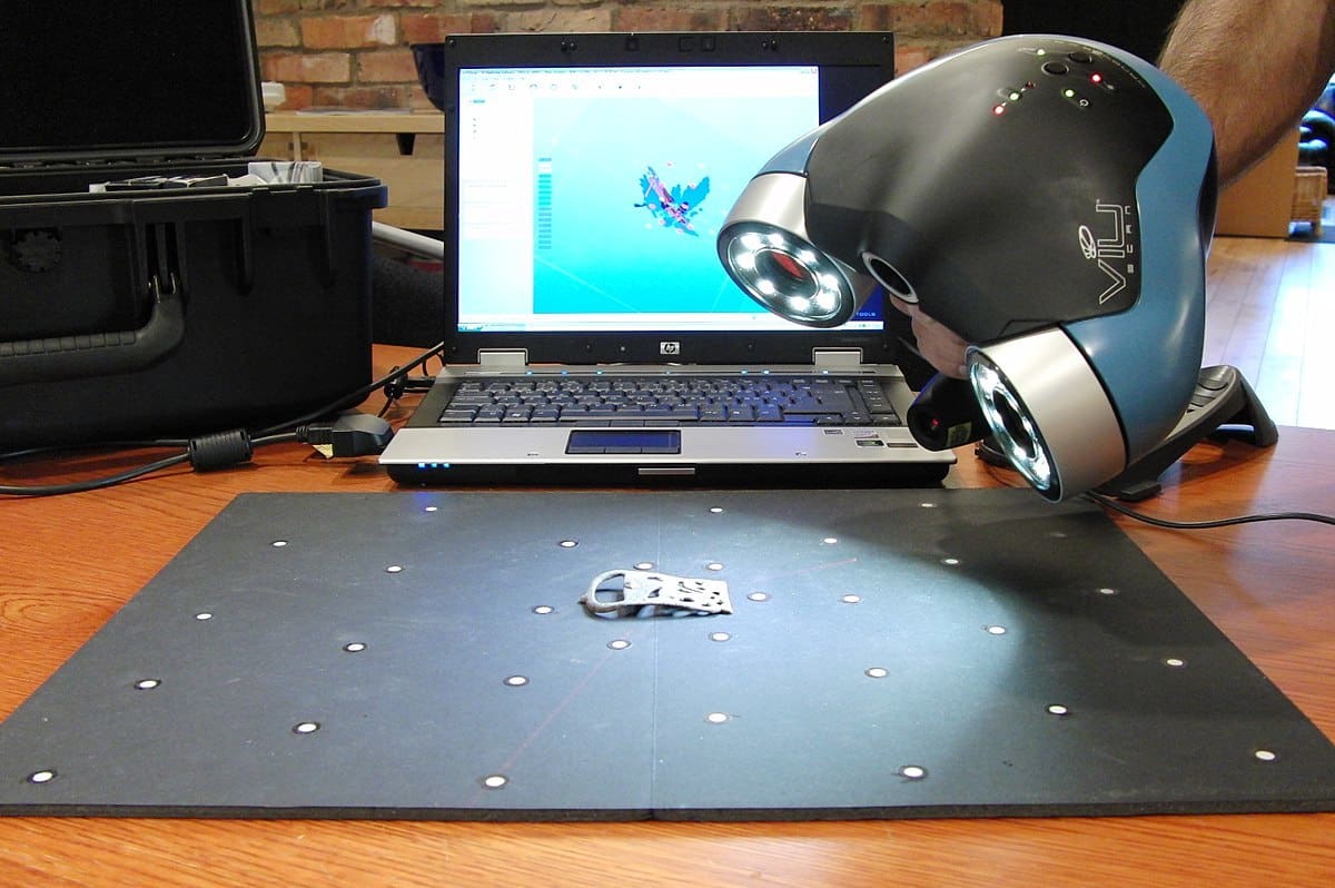 Using a handheld 3D scanner.