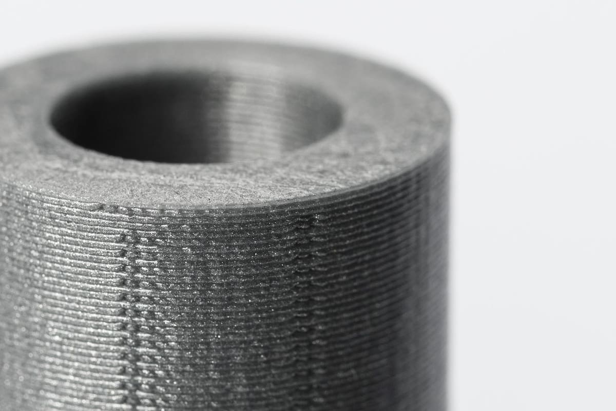 The layers in this 3D printed object are clearly visible.