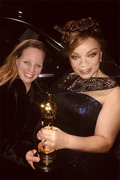 3D Designer Julia Körner and award winning Costume designer Ruth E. Carter posing with the recently won Oscar award.