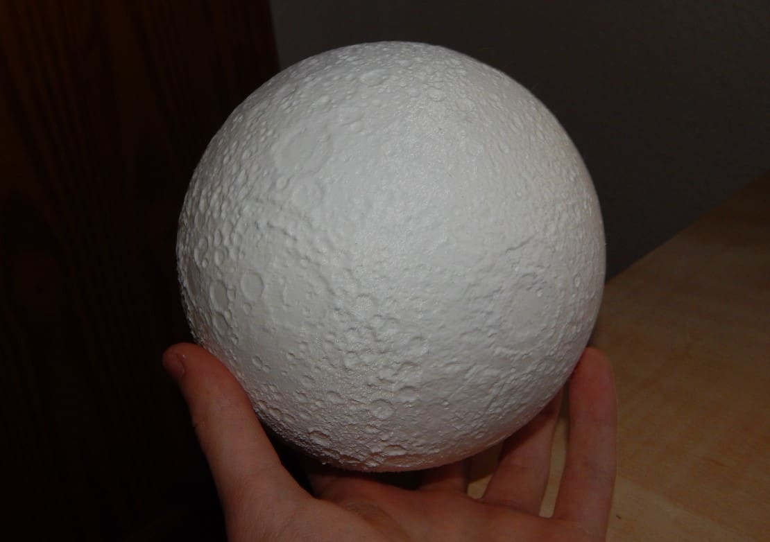 A moon 3D printed in White Hatchbox PLA.