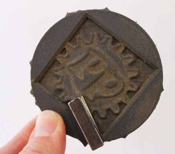 A magnet sticking to a print made with Proto-Pasta's special PLA.