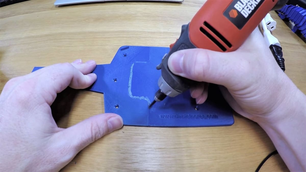 Welding together two 3D prints.