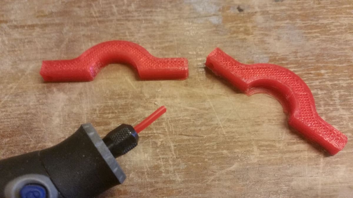 A Dremel tool with collet and filament ready to go.