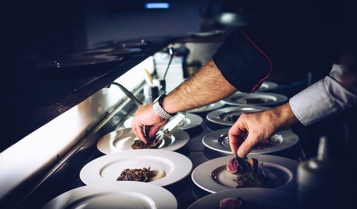 Chefs plating Redefine Meat's product.