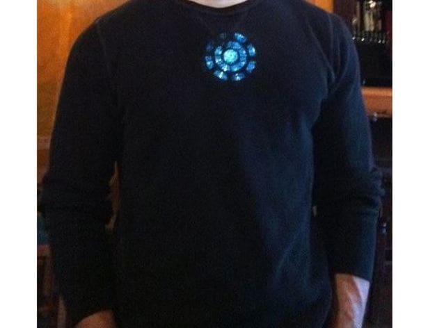 The printed wearable arc reactor looks pretty realistic when outfitted with LEDs.