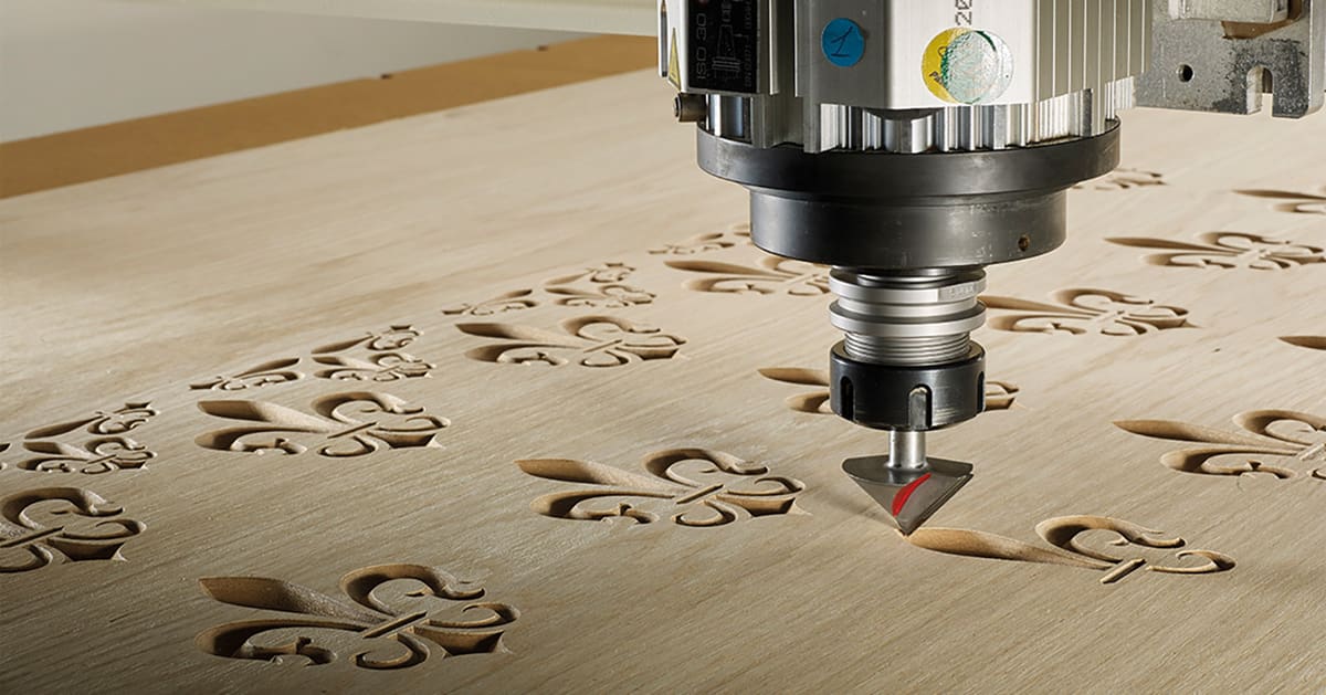 A CNC router cutting repetitive, intricate patterns.