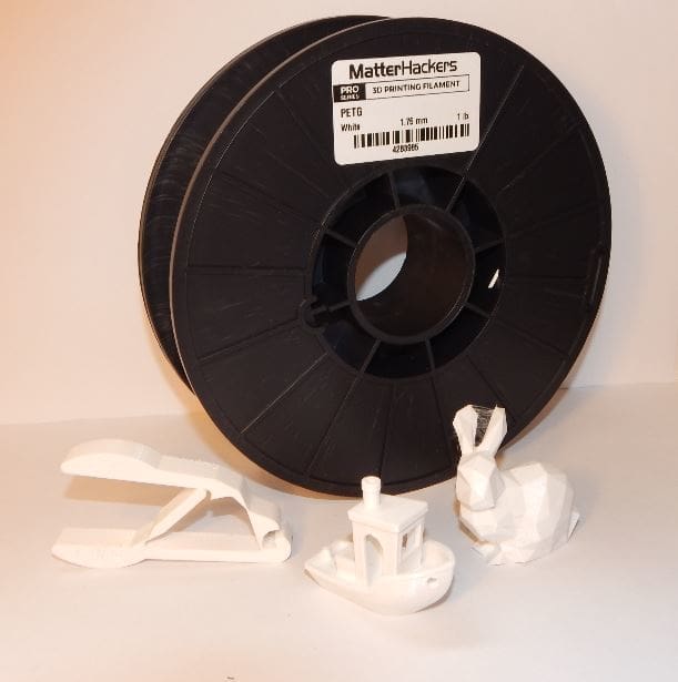 Our Pro PETG test prints, with the spool in rear.