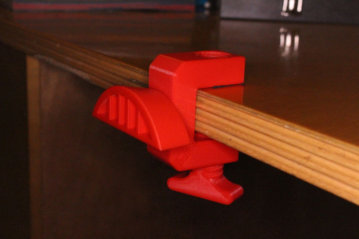 This clamp can hold your headphones or other object off of your desk