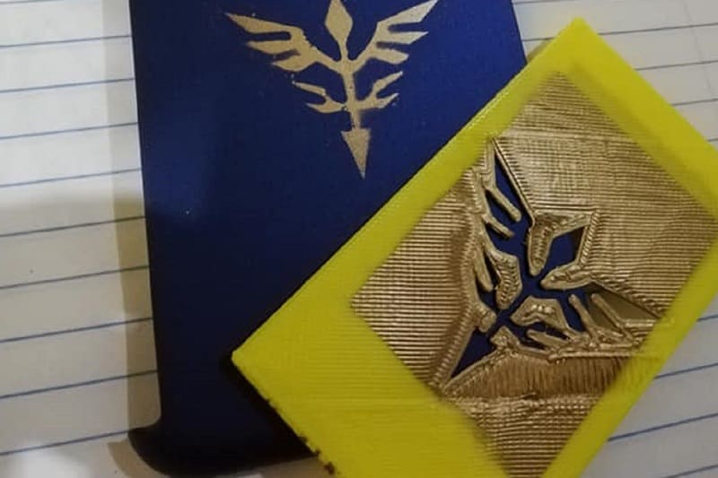 This stencil makes it easy to give your phone a classic Neo Zeon design