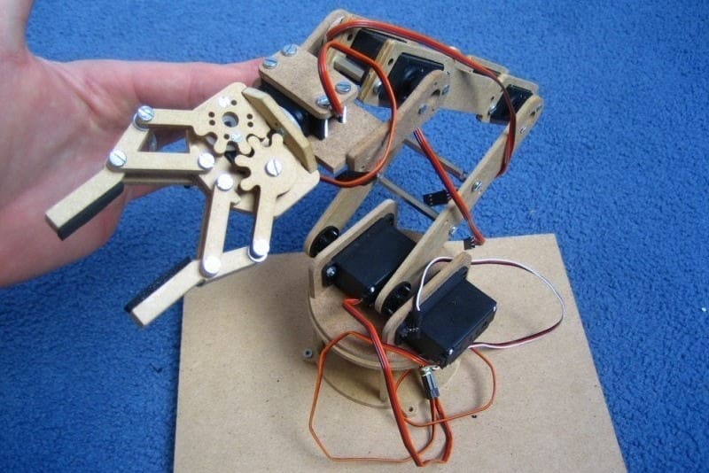 Your Glowforge can make your own lab assistant in the form of a robotic arm