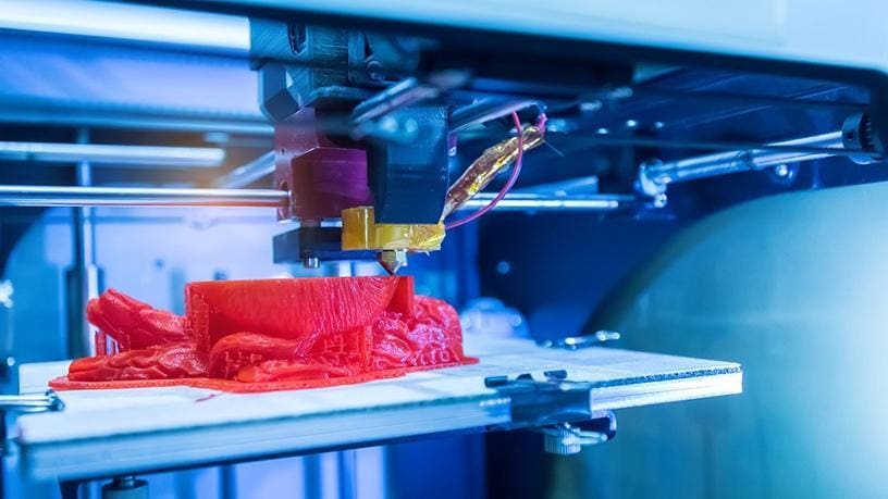 An FDM print in process