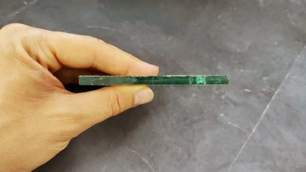 How passes will it take to cut .2 inches of glass?
