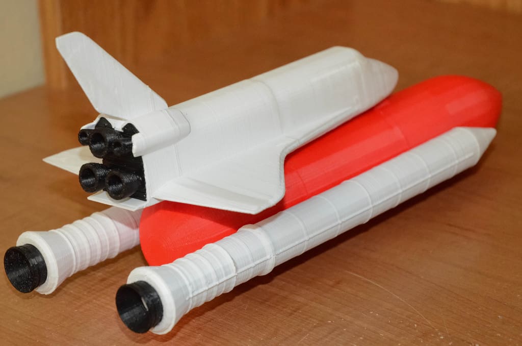 The orbiter with its fuel tank and boosters
