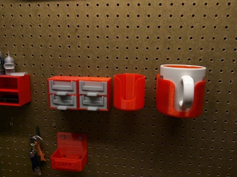 These cup holders were designed to be mounted to any pegboard