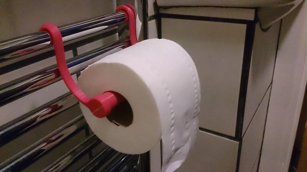 No need for screws – this holder piggybacks on railings