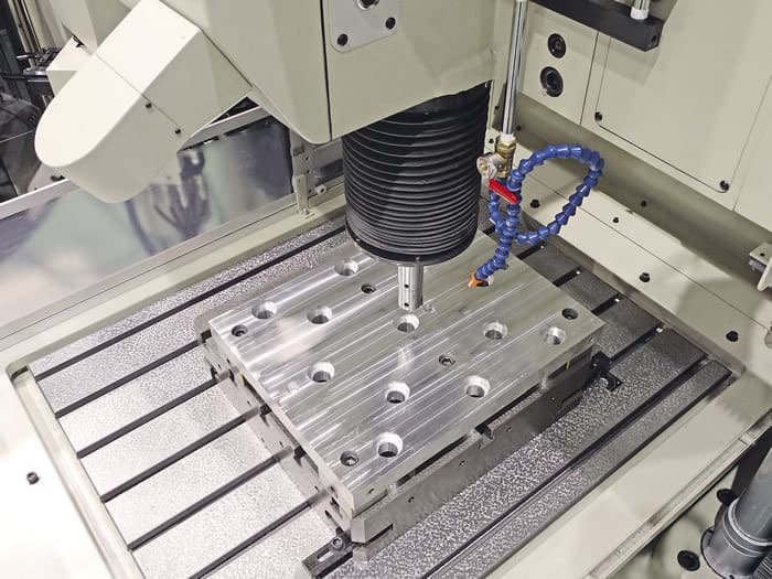 A jig borer boring a hole