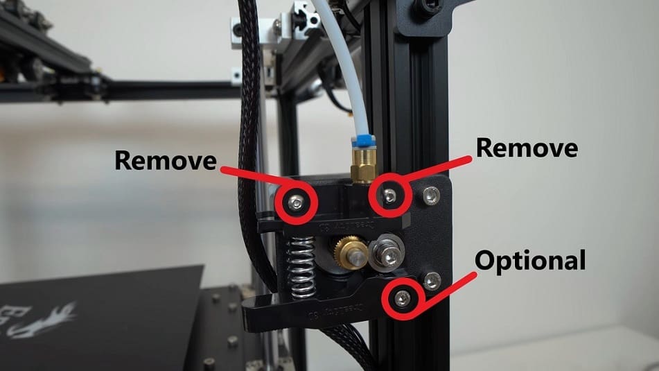 Which screws to take out to remove the serve we no longer need.