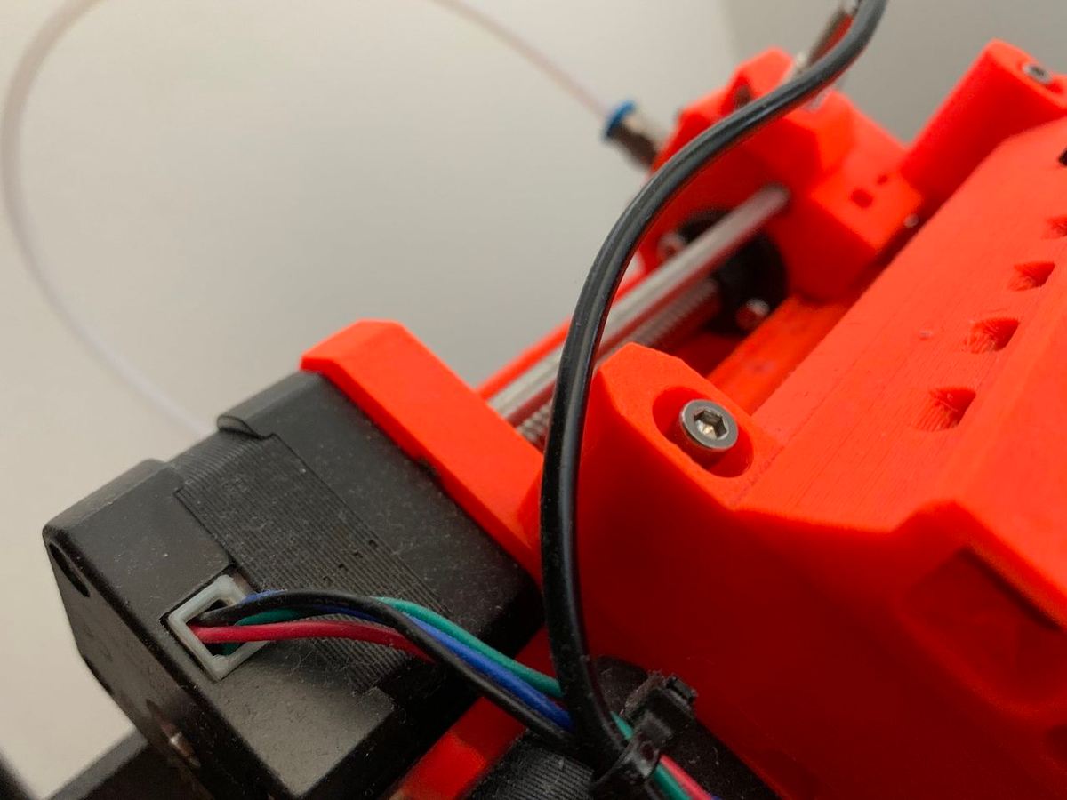 The screw head should sit just above the surface