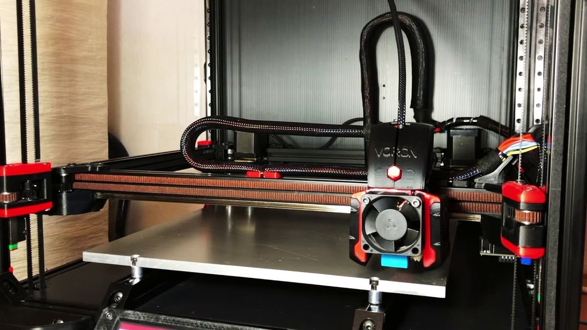 A maker leveling the gantry