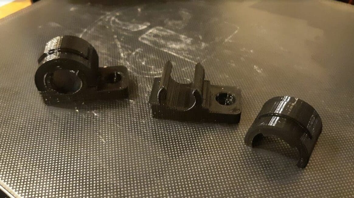 Use a screwdriver to pry the halves back apart if you need to access the cables.
