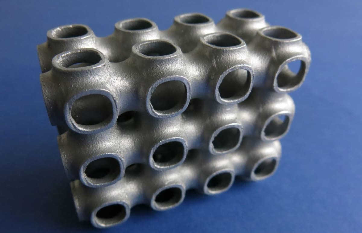SLM printers print in metal and have a controlled atmosphere