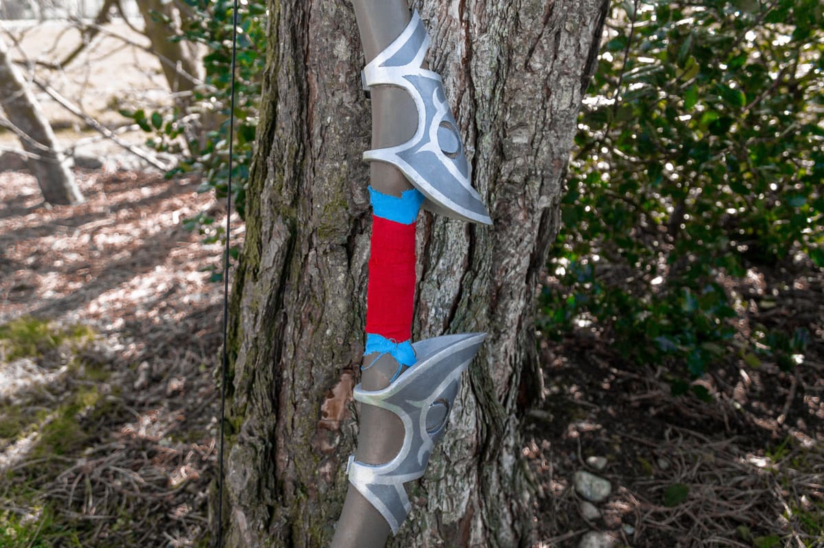 A close-up on the detailed handle of the bow