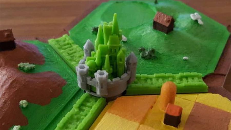 Catan for two players is an unofficial version by BGG user Shawn Rifraf