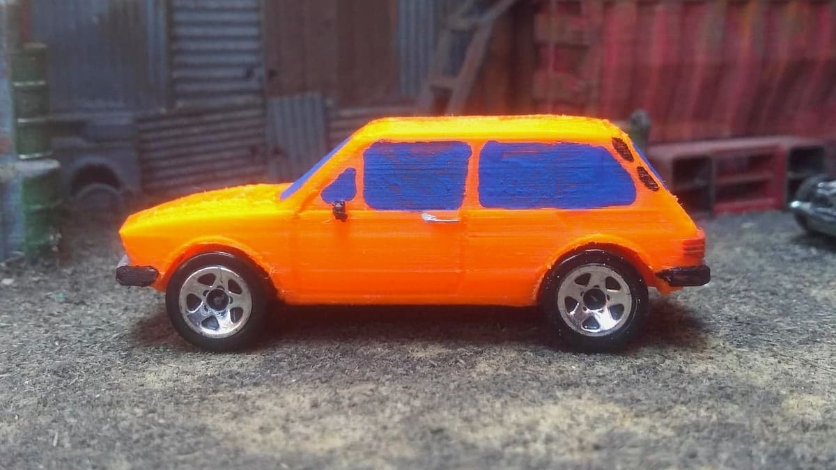 This car is a 1/64 scale model and is Hot Wheels car-sized