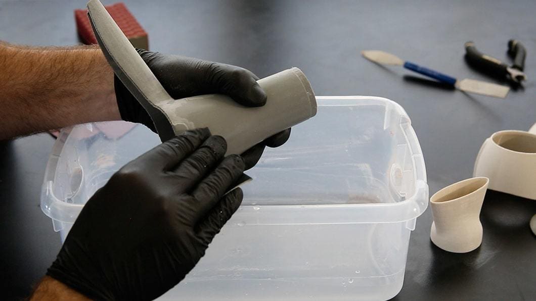 Sanding is a common method of smoothing 3D prints