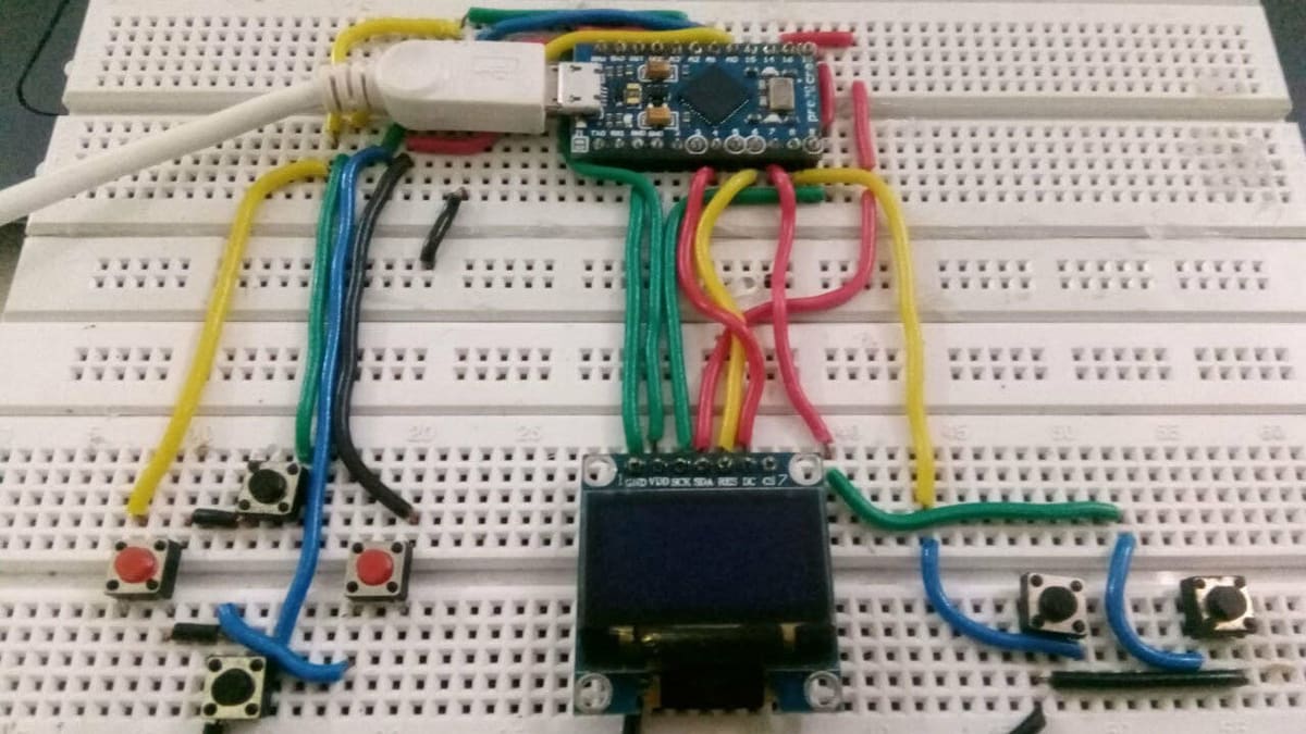 Arduboy is a miniature game system the size of a credit card. It's also open source, which means you could make your own Arduboy with the Arduino Micro!