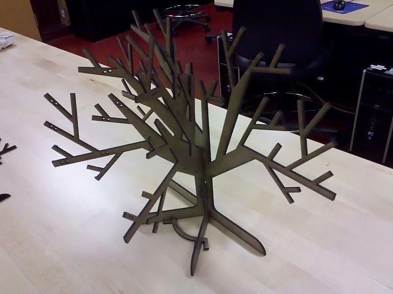 Keep your jewelry organized with actual wood on this model tree
