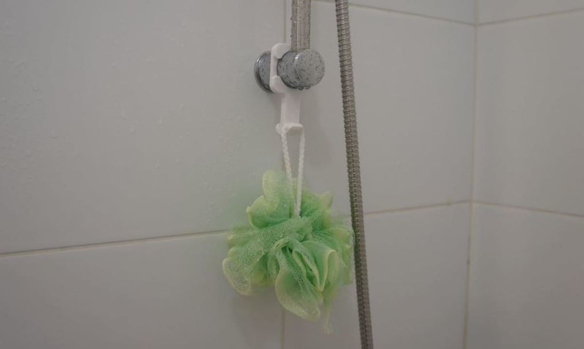 You can hold shower accessories on this hook like a soap saver