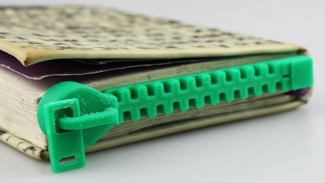 This playful design will keep your reading zipped up!