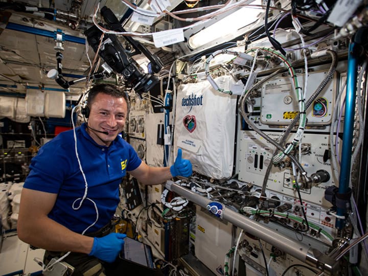 NASA astronaut Drew Morgan working with the BioFabrication Facility on ISS