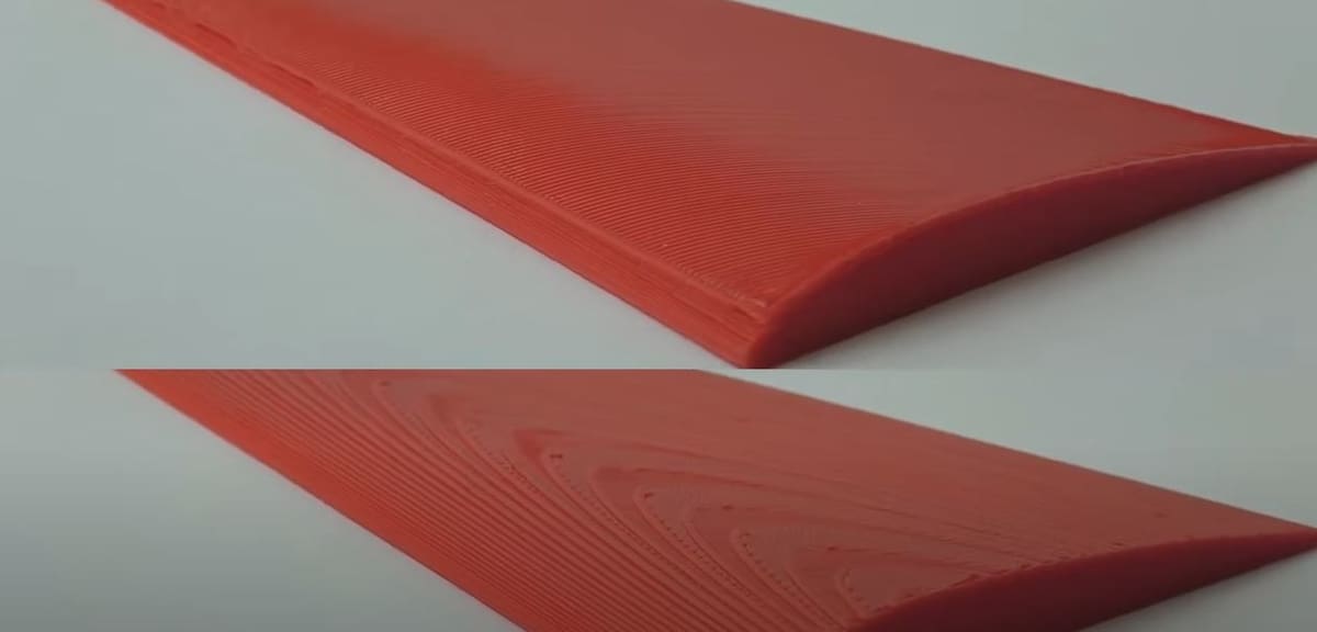The top object was printed with non-planar 3D printing, while you can clearly see the stair-casing on the bottom print
