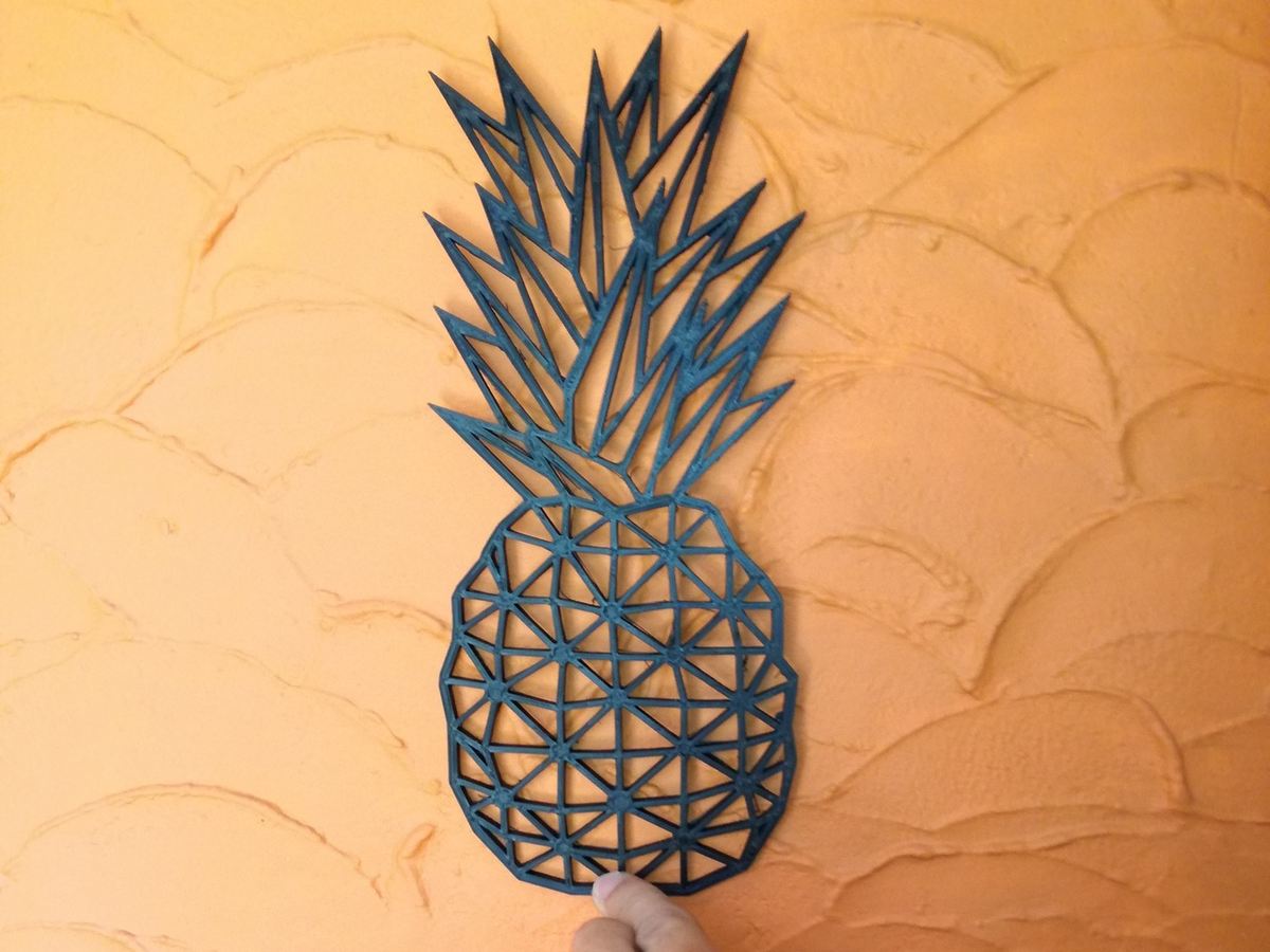 Add some tropical flair to your walls with this punchy pineapple!