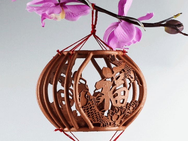 A lantern with symbols for prosperity and tranquility